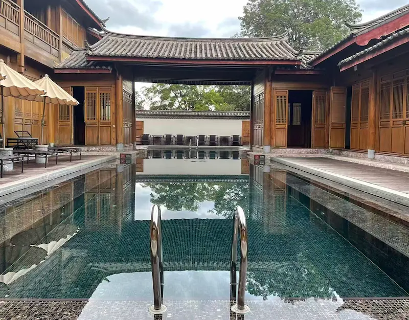 Step Into Splendor: My 6-Day Luxury Travel Itinerary Through Beijing and Lijiang lijiang aman swimmingpool