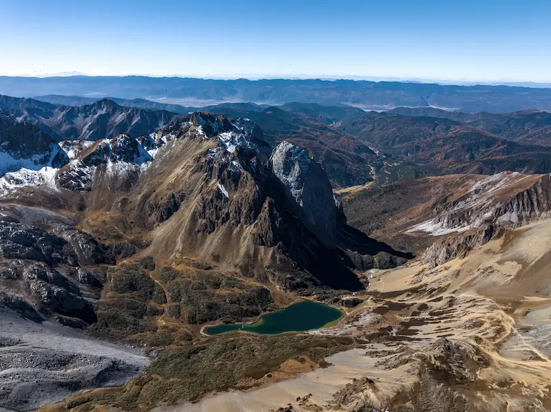 From Megacities to the Highlands | Small Group Tour abujicuo lake yunnan